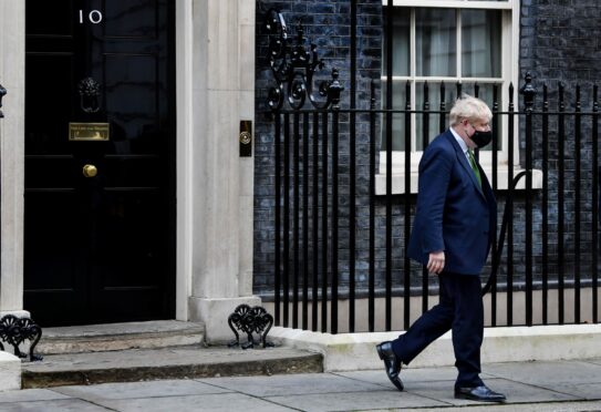 Boris Johnson walks out of No 10 on Wednesday to face MPs in the Commons