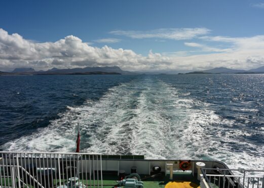 A CalMac ferry travels through The Minch on a journey from Ullapool to Stornoway