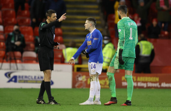 Ryan Kent gets his marching orders from referee Kevin Clancy at Pittodrie last Tuesday night