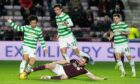 John Souttar slides in to tackle Celtic’s Reo Hatate in midweek. But will a deal be reached for him to exit Tynecastle early to move to Rangers, in similar fashion as Tony Watt departing Motherwell to join Dundee United?