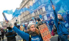 NHS workers protest against mandatory Covid-19 vaccinations during a march in London yesterday
