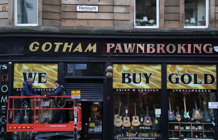 A pawnbrokers is given a Gotham makeover (Pic: Andrew Milligan/PA Wire)