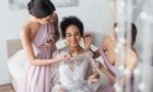 Bride getting ready with bridesmaids