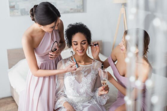 Bride getting ready with bridesmaids