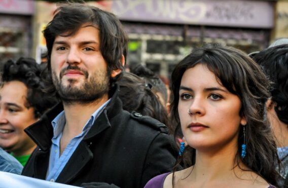 Gabriel Boric, president-elect of Chile, with Camila Vallejo as students in 2012 at a march in Santiago