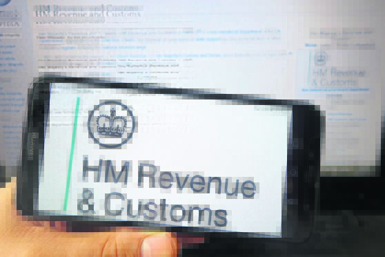 HM Revenue and Customs logo displayed on mobile phone.
