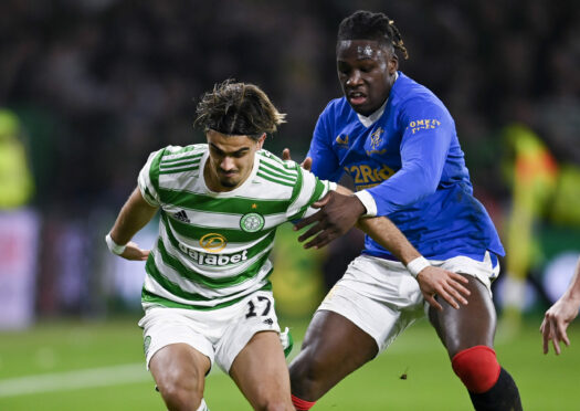 Jota torments Rangers defender Calvin Bassey during Celtic’s convincing 3-0 win last Wednesday night