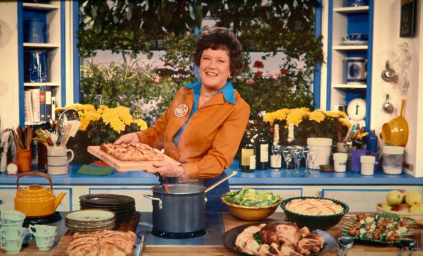 Julia Child in her TV cookery Show in the 60s