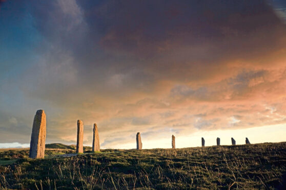 Ring of Brodgar in dramatic evening light and cloudscape