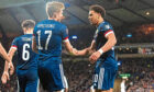Stuart Armstrong and Che Adams – seen during Scotland’s last match with Denmark – have been in fine form, and scoring goals, for Southampton.