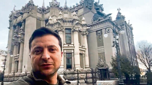 Ukrainian President Volodymyr Zelenskyy speaks to the nation via his smartphone in the centre of Kyiv, Ukraine.