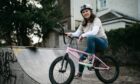 Mum Jackie Hood now loves to BMX and do extreme sports with her sons after surviving breast cancer.