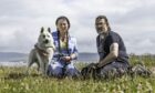 Helen Hart and Jason Tilbury with pet dog on their croft on the Shetland island of Yell