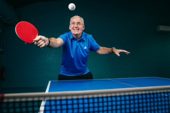 Brian Carson, who has Parkinson's, enjoying a game of table tennis at Drumchapel Sports Centre in Glasgow
