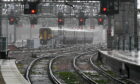 A train leaves Glasgow Central Station before Storm Dudley hit