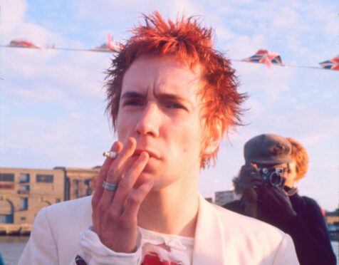 Sex Pistols - John Lydon at Riverboat party on the Thames in 1977.
