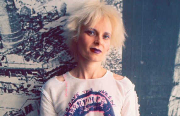 Vivienne Westwood, pictured in 1977 in a Pistols shirt, at her famous Seditionaries clothes shop at 430 King’s Road, London