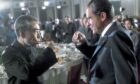 Richard Nixon shares a toast with Chinese Premier Zhou Enlai at a banquet in Beijing in 1972