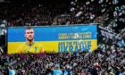 West Ham fans show support for their Ukrainian winger Andriy Yarmolenko and his country at the London Stadium on Sunday