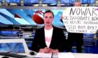 Marina Ovsyannikova: Russian journalist interrupts a live news bulletin on Russia's state TV "Channel One"