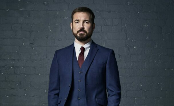 Martin Compston as DS Steve Arnott.