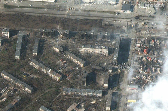 Damaged and burned apartment buildings in Mariupol, Ukraine (Pic: Maxar Technologies via AP)