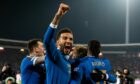 Connor Goldson celebrates after Ryan Kent's goal in Serbia
