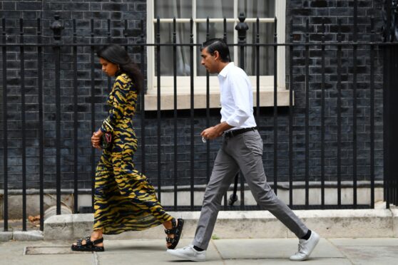 Rishi Sunak, Chancellor of the Exchequer, and his wife Akshata Murthy leave No.10 Downing Street.