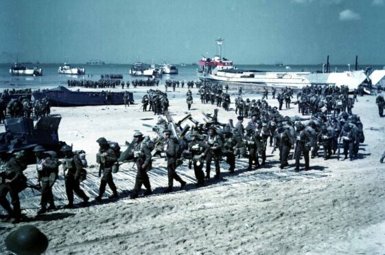 Canadian soldiers being deployed on Juno Beach, Normandy, shortly after D-Day in 1944