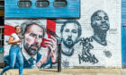 England manager Gareth Southgate, hailed for kindling a different kind of patriotism, and stars Harry Kane and Raheem Sterling on a mural in London after Euros last year

Pic: Guy Bell