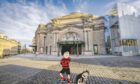 Dennis Gnasher in front of usher hall - a perfect place for usher hall a family trip in Scotland