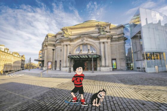 Dennis Gnasher in front of usher hall - a perfect place for usher hall a family trip in Scotland