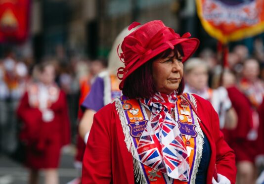 Marchers join an Orange walk to Glasgow Green in September