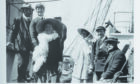 On board the Terra Nova in 1910, Captain Edward Evans, second left, who was second in command on the ill-fated  expedition, beside his wife Hilda and the expedition’s doctor Edward Wilson and wife Oriana, next to Joseph Kinsey, far right, a shipping tycoon and supporter of Captain Scott. Evans would narrowly survive but Wilson did not return from the Antarctic