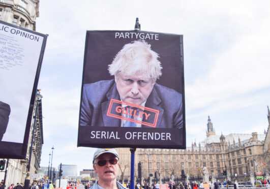 A protester in Parliament Square (Pic: Vuk Valcic/SOPA Images/Shutterstock)