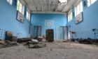 Basketball hoops and climbing frames remain but the school gym hall in Sorokivka is in ruins after being used as a base by both Russians and the Ukrainians troops