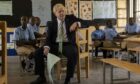 Prime Minister Boris Johnson attends a lesson during a visit to the GS Kacyiru II school on the sidelines of the Commonwealth Heads of Government Meeting on in Kigali, Rwanda.
