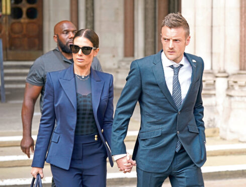Rebekah and Jamie Vardy leave the Royal Courts Of Justice, London.
