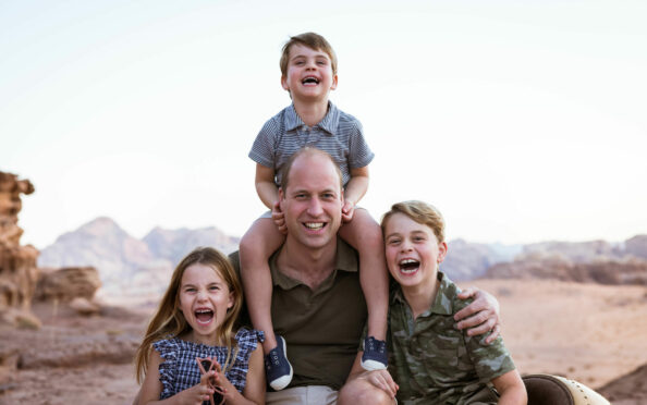 Prince William with his children, Louis, George, right, and Charlotte in snap released to mark Father’s Day today,