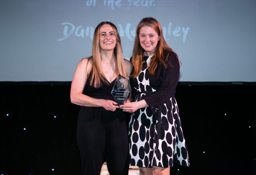 Danni McGinley (left) winning the SWPL2 Player of the Year Award presented by SWF chief executive Aileen Campbell (Pic: Andrew Cawley)