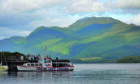 Boat cruise on the glassy-smooth Loch Lomond