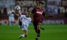 Alexandro Bernabei (right) in action for Lanus and showing the skills that put him on Postecoglou’s shopping list