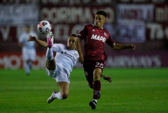 Alexandro Bernabei (right) in action for Lanus and showing the skills that put him on Postecoglou’s shopping list