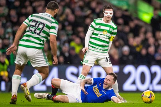 Celtic play Rangers at Parkhead last season with both teams featuring gambling firms on their shirts.