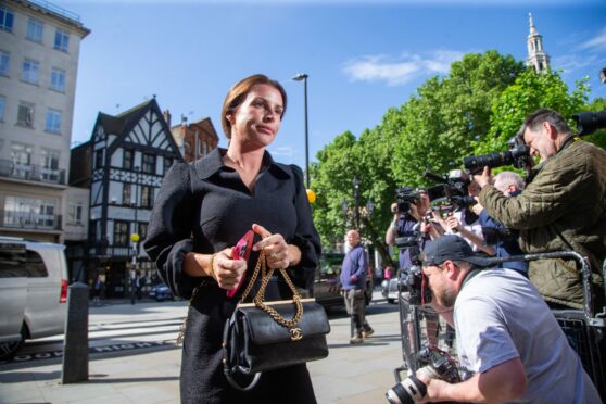 Coleen Rooney arrives at the Royal Courts of Justice during the libel trial
