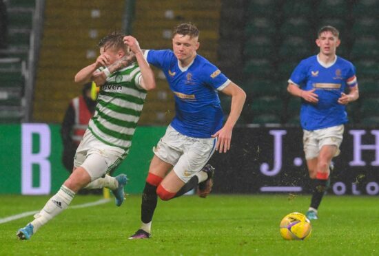 It was no-holds-barred when the Old Firm met in the Lowland League last season, and Kyle McClelland was booked for this challenge.