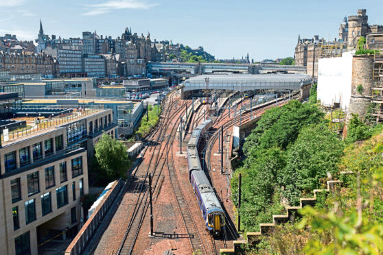 A train departs Edinburgh’s Waverley station.