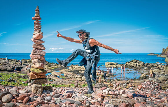 Pedro Duran at the European Stone Stacking showdown in Dunbar, East Lothian last week, just one of the events attracting visitors to Scotland