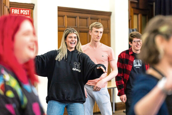 Imogen Bews, Dillon McFarlane and Ruaraidh McBain of Scottish Opera Young Company during rehearsals.