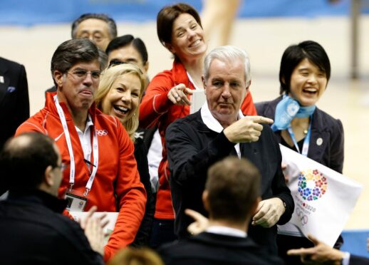 Craig Reedie, second right, gestures on a visit to Tokyo Metropolitan Gymnasium in 2013, part of an inspection of Japan’s bid to host the 2020 Olympic Game